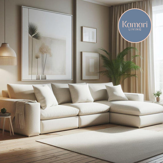 Piye minimalist corner sofa in light cream fabric, styled in a bright living room with natural wood flooring and soft neutral decor by Kamari Living